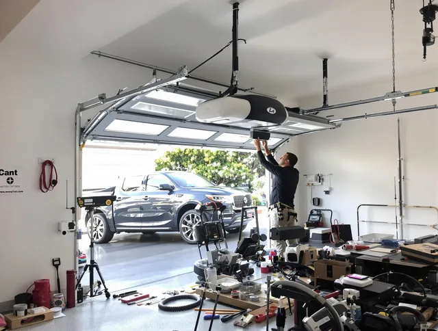 Grove City Garage Door Repair specialist installing smart garage door opener system in Grove City home