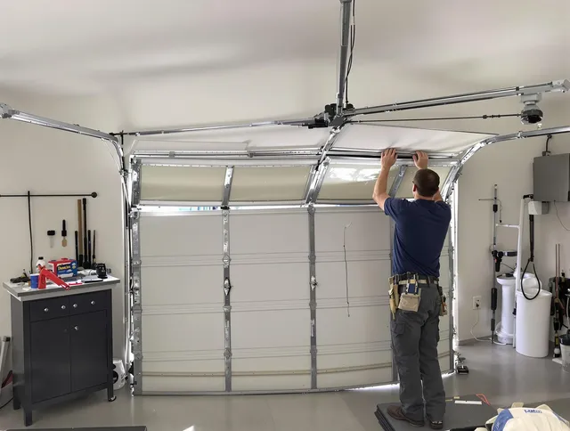 Grove City Garage Door Repair specialist performing precise section replacement on Grove City garage door