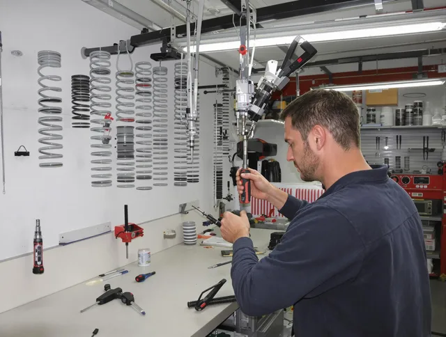 Grove City Garage Door Repair safety certified technician performing precision spring replacement in Grove City