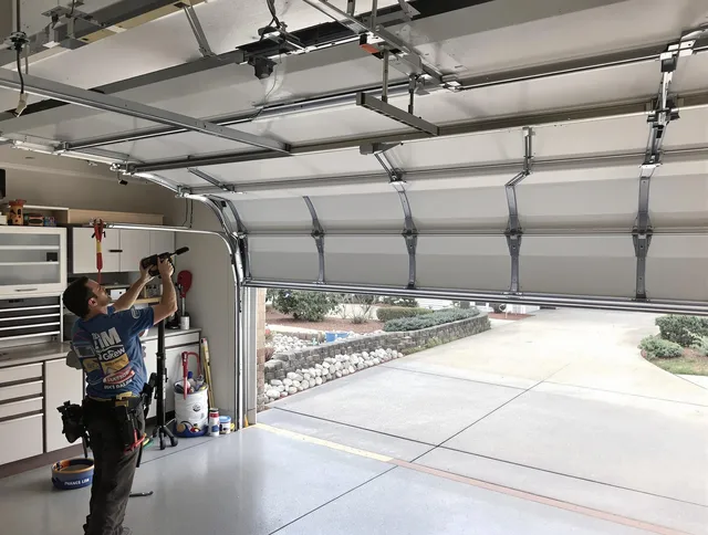 Garage door track repair service by Grove City Garage Door Repair in Grove City